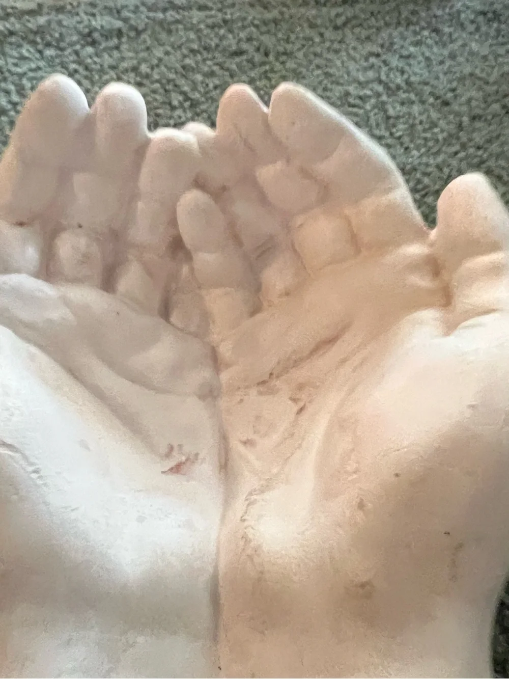 Giving Hands made of plaster of Paris and colored with white